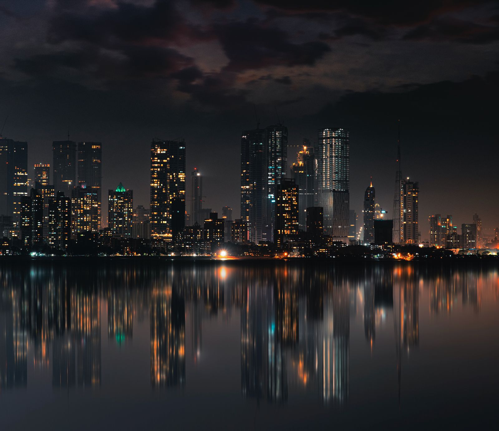 The Mumbai skyline seen across the water.